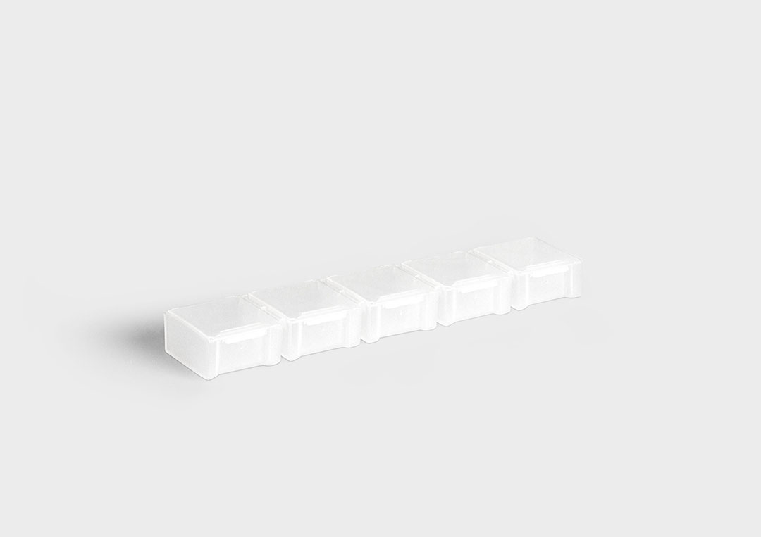 InsertSplitBox InsertSplitBox: a multiple packaging system with individual detachable units.